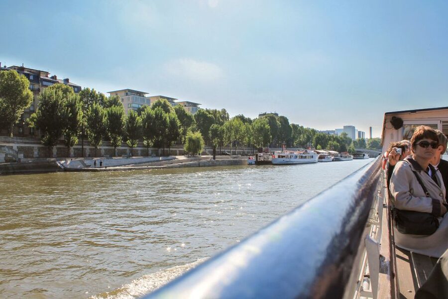 Paris: Seine River and Canal Saint-Martin Cruise - First look at the Canal Saint-Martin: bridges, chestnut trees, and fishermen