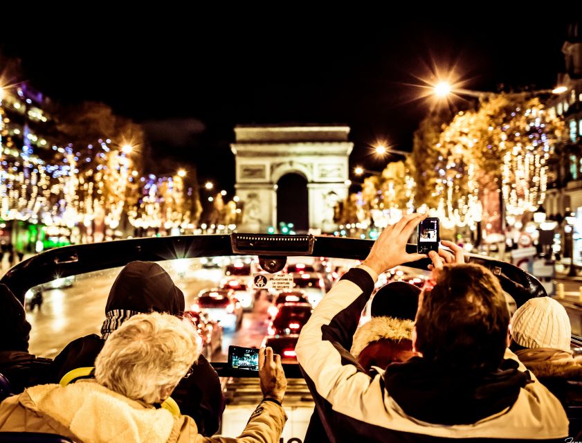 Paris: Tootbus Open-Top Christmas Bus Tour - Getting on board at 23 Boulevard des Capucines, and scoring the best seats