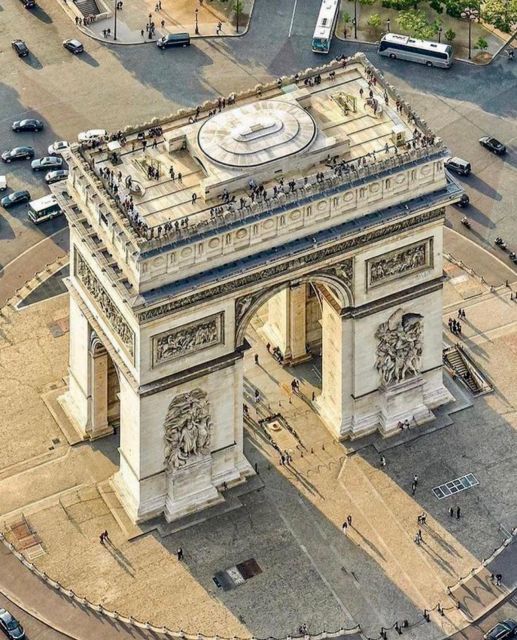 Paris Top Sights Half Day Walking Tour with a Fun Guide - The Louvre gets a mention, and the guide’s stories do the heavy lifting