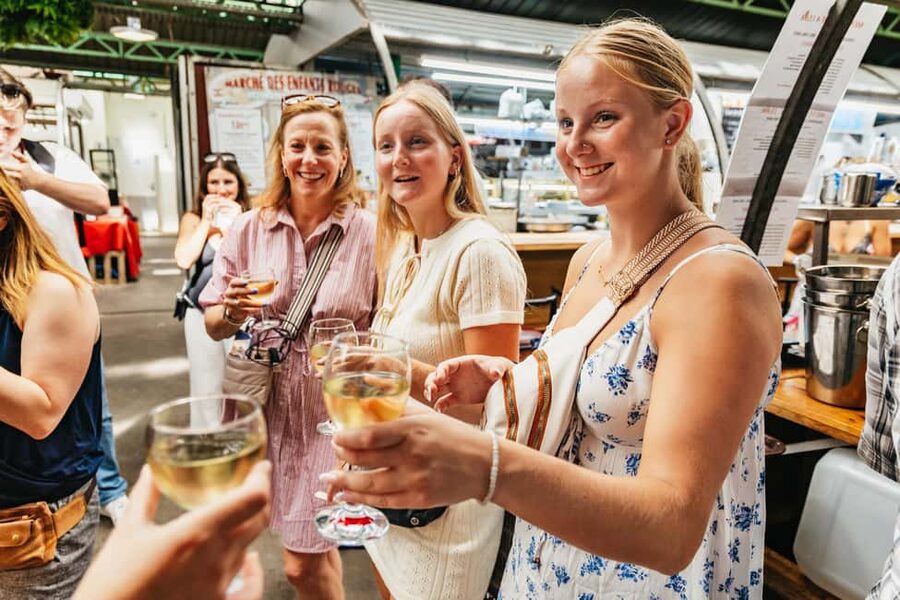 Paris: Walking Food Tour with Cheese, Wine and Delicacies - Entering Le Marais, a neighborhood built for wandering