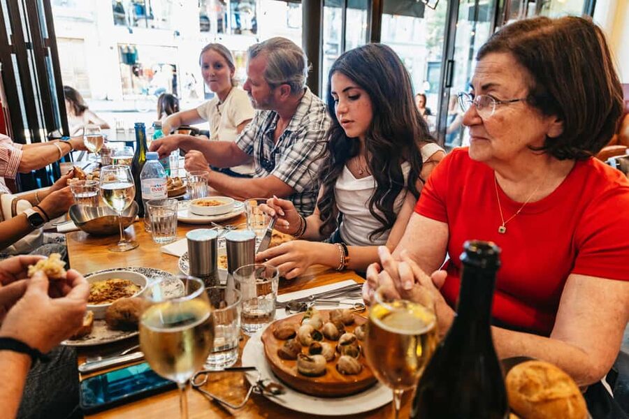 Paris: Walking Food Tour with Cheese, Wine and Delicacies - The traditional market stop, when the Marais turns real