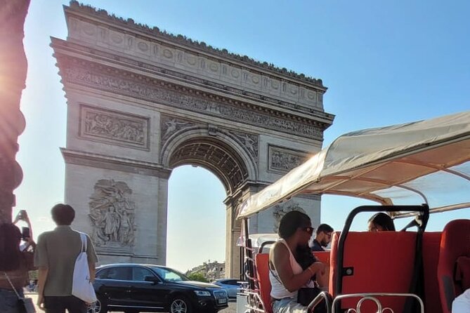Paris with a Tuk Tuk - Private 2-Hour TukTuk Tour - Stop 1, Eiffel Tower: quick photo time with big-view payoff