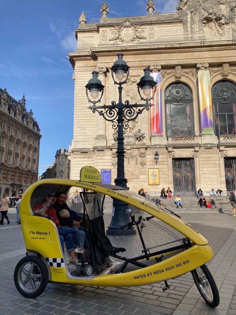 Private guided tour by electric bike taxi - Getting started at Place Rihour, Office de Tourisme de Lille