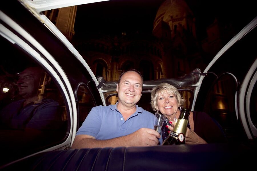Private tour of Paris by Night with Champagne - From Louvre area to Notre Dame and Opera Garnier