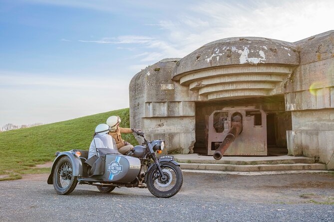 Private vintage sidecar tour of the D-Day Landing Beaches - Longues-sur-Mer: Atlantic Wall guns with a view of what bombardment really meant