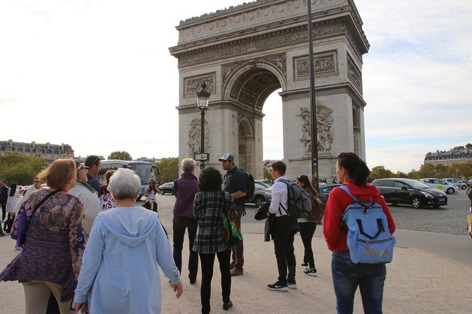 See 10+ Top Paris Sights, Fun Guide - Moulin Rouge and the Arc de Triomphe: iconic viewpoints without the heavy ticket work