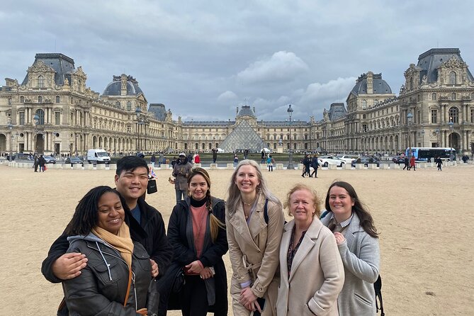 See 15+ Top Sights Paris Tour with Fun Guide, (Walking and Metro Tour) - Arc de Triomphe: 10 minutes for photos and context