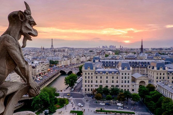 See 15+ Top Sights Paris Tour with Fun Guide, (Walking and Metro Tour) - Conciergerie and Ile de la Cite: free stops that anchor Old Paris