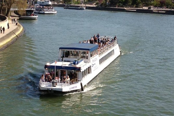 Seine River Cruise and Paris Canals Tour - Entering Canal Saint-Martin near the Bastille: locks, a tunnel, and close-up engineering