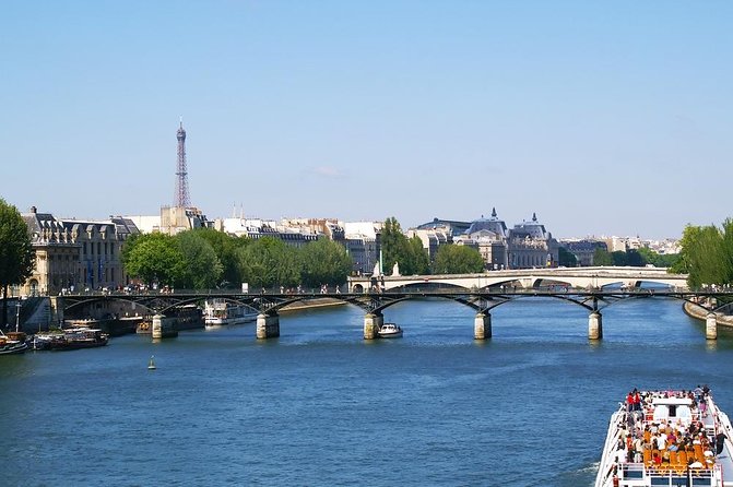 Seine River Cruise and Paris Canals Tour - On board the boat: inside cabin, deck time, and hearing the guide