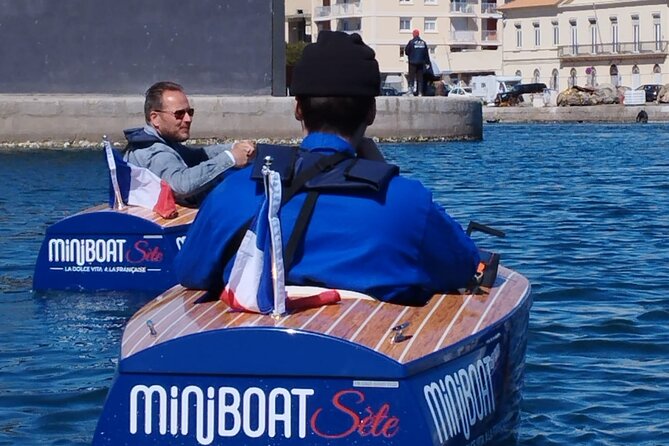 Sète by Miniboat Guided Ecotour - Royal canal glide toward the St Louis mole