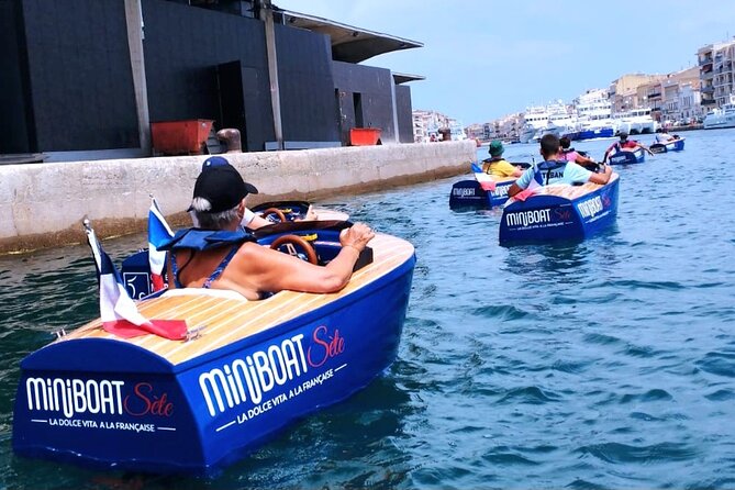 Sète by Miniboat Guided Ecotour - Starting at Pont de la Civette, at the jouster statue foot