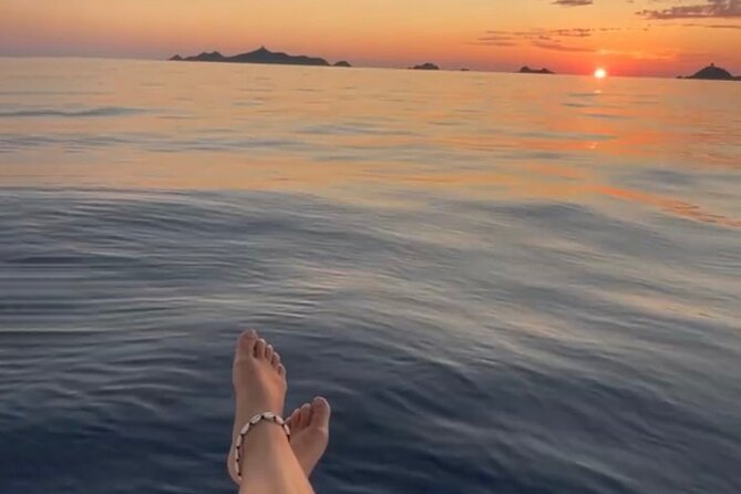Sunset boat cruise with Aperitif at the Sanguinary Islands - Iles Sanguinaires stop: aperitif, short walk, and real water time