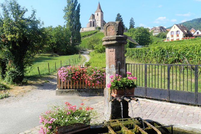 The Emblematic: visit of villages, Haut-Koenigsbourg, Wine tasting - Stop 1: Hunawihr Fountain and Fortified Church in 45 Minutes