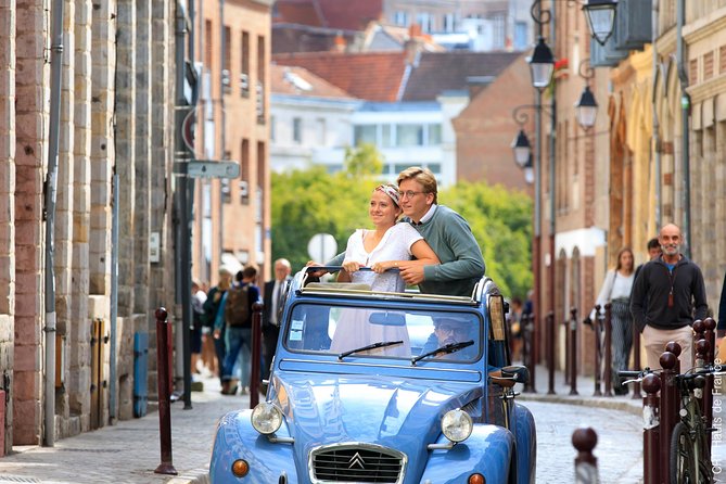 Unique Tour of Lille by Convertible 2CV - 1h00 - Cathedrale de la Treille and the Hospice Comtesse Museum Stop