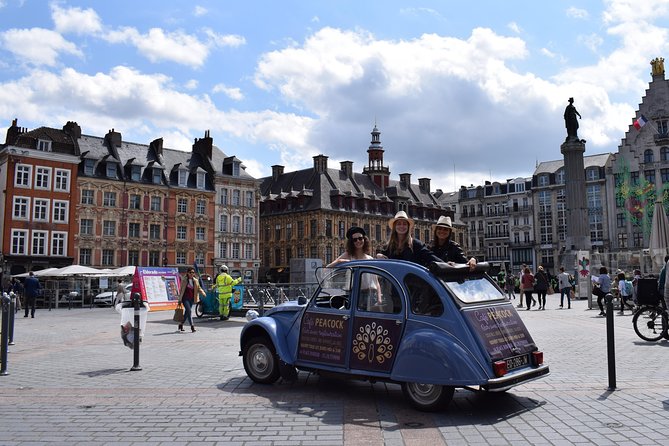 Unique Tour of Lille by Convertible 2CV - 1h00 - Where the Tour Starts: Place Rihour as Your Orientation Base