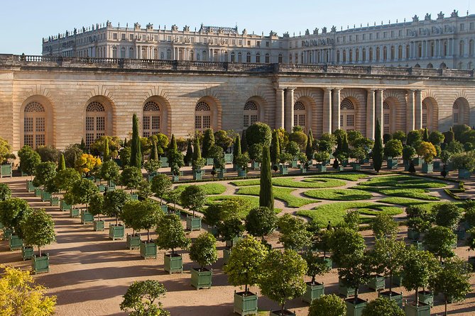 Versailles: Full Day Tour & Shuttle from Paris - Transport, group size, and the real comfort issues (air-conditioning included, sometimes debated)