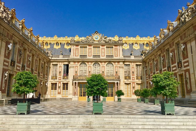 Versailles Palace and Giverny Private Guided Tour from Paris - Giverny village time: flowers, galleries, and a real break from the crowd