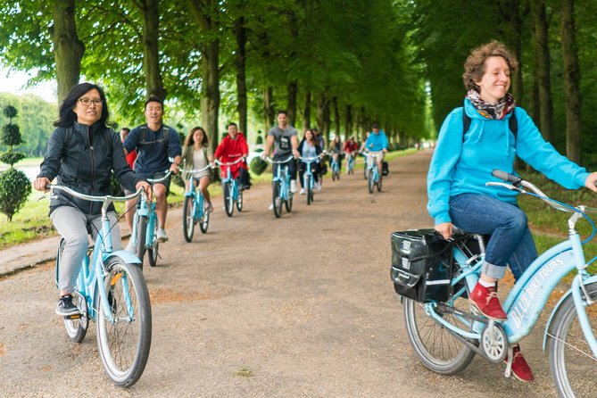 Versailles Palace Bike Tour with Market & Marie-Antoinette hamlet - Grand Canal to Petit Trianon: Two Palaces, One Story Arc