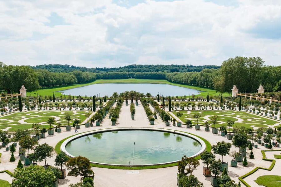 Versailles: Palace, Gardens & Marie Antoinette’s Estate Tour - Versailles Gardens guided walk: statues, basins, and tree-lined views